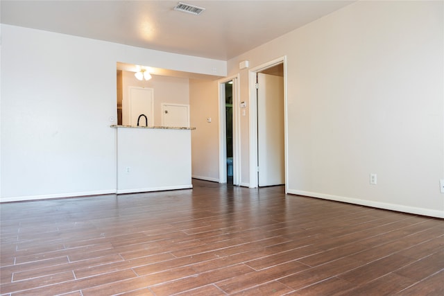 unfurnished room featuring hardwood / wood-style floors