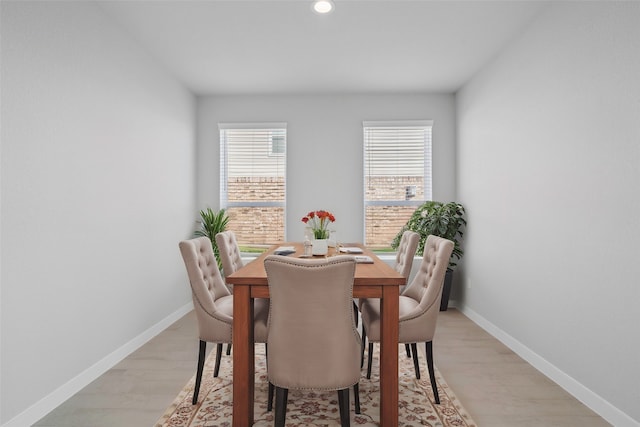 dining room featuring light hardwood / wood-style floors