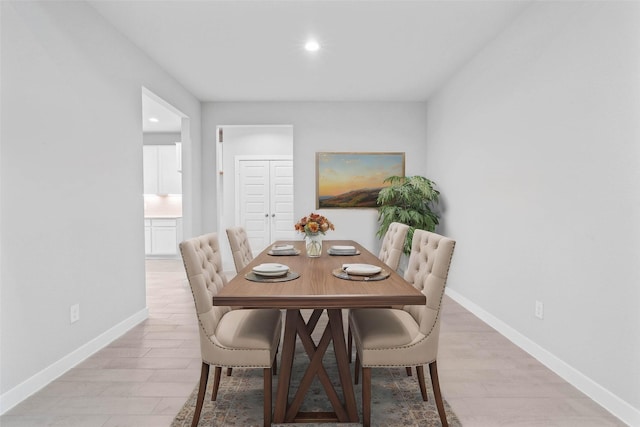 dining room featuring light hardwood / wood-style flooring