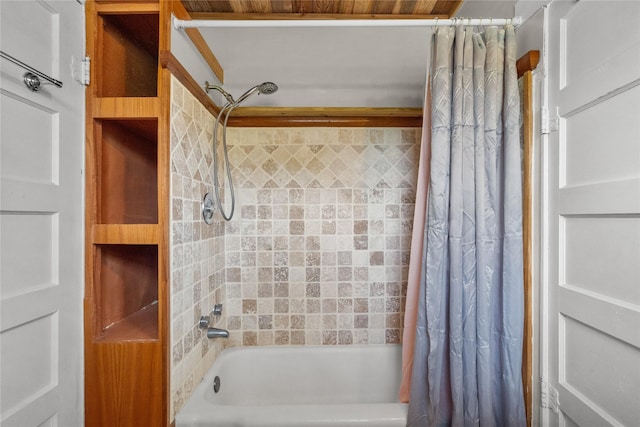 7506 2nd St, Hitchcock, TX 77563 - bathroom featuring shower / bath combination with curtain