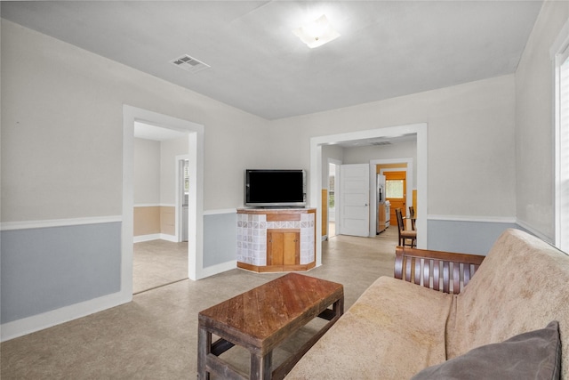 7506 2nd St, Hitchcock, TX 77563 - living room featuring baseboards and visible vents