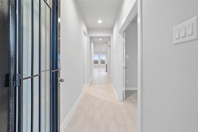 hall featuring light wood-type flooring