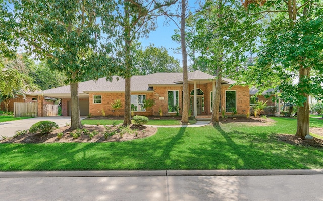 ranch-style home with a front yard