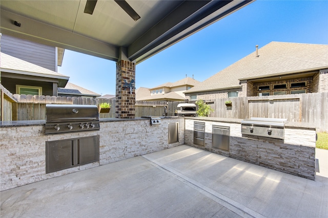 view of patio / terrace with a grill and area for grilling