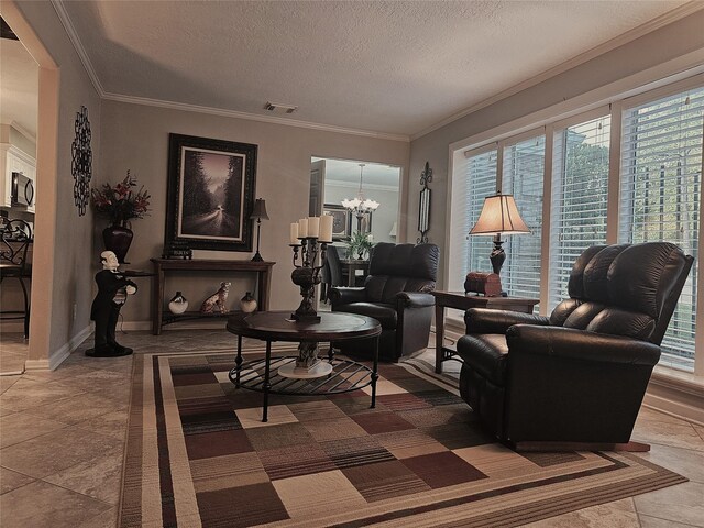 living room featuring crown molding, tile patterned floors, and an inviting chandelier