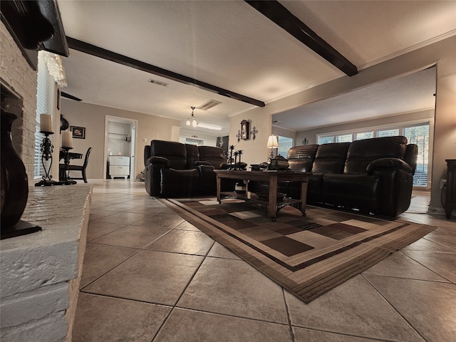 tiled living room with beam ceiling and brick wall