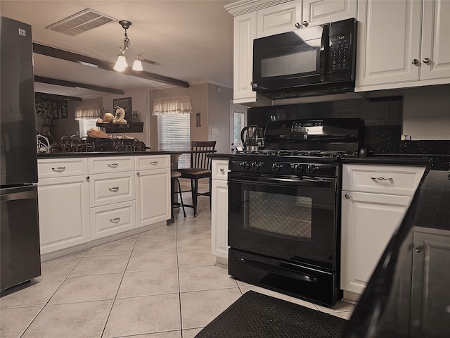 kitchen with hanging light fixtures, white cabinetry, light tile patterned floors, black appliances, and crown molding