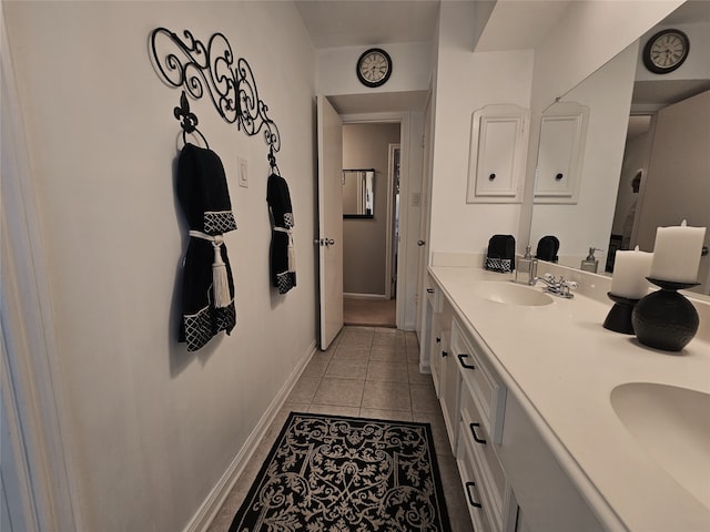 bathroom featuring double vanity and tile patterned floors