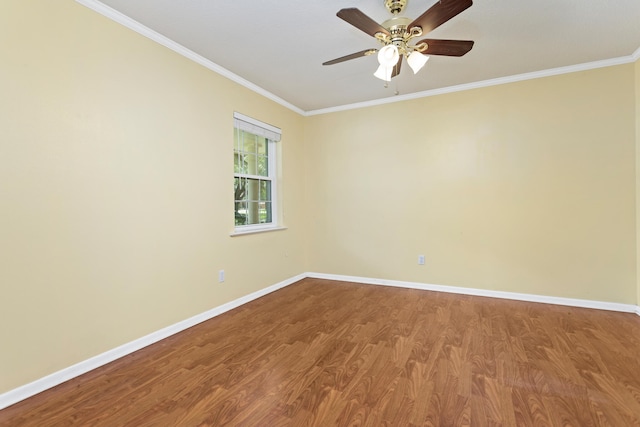 unfurnished room featuring ceiling fan, ornamental molding, and wood-type flooring