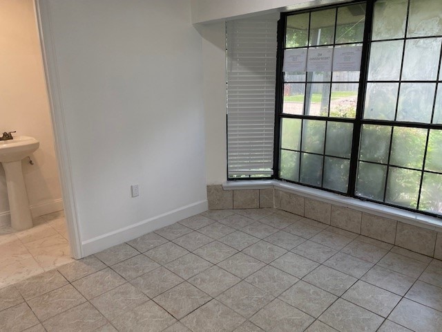 view of tiled spare room