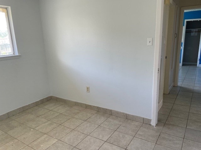 view of tiled spare room