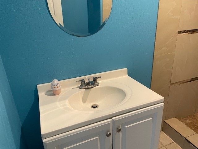 bathroom featuring tile patterned floors and vanity