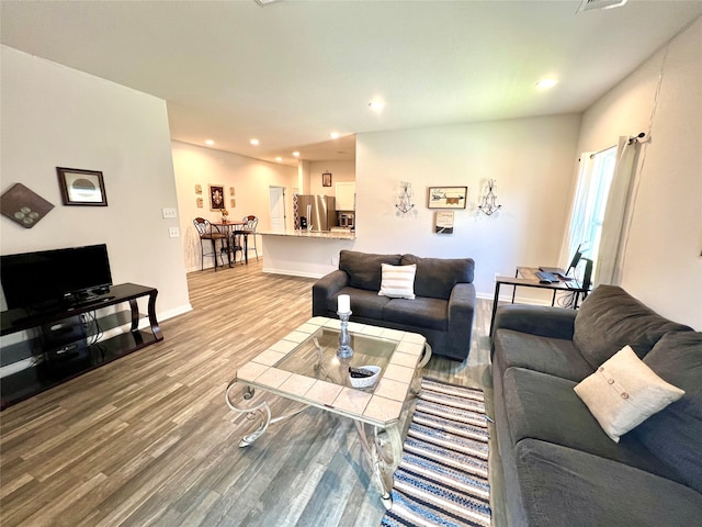 living room with hardwood / wood-style flooring