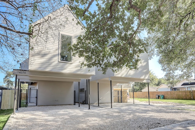 view of front of house with a carport