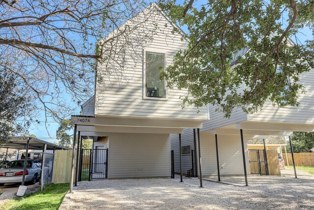 exterior space featuring a carport