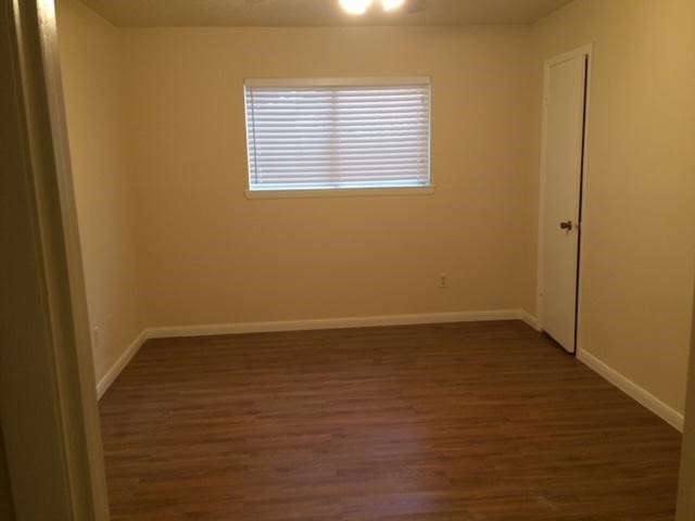 empty room featuring hardwood / wood-style floors