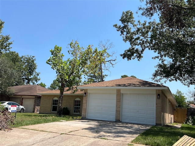 single story home with a garage