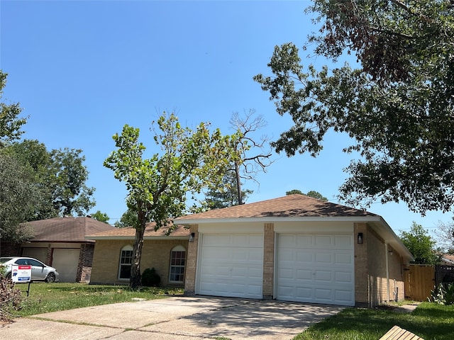 single story home with a garage