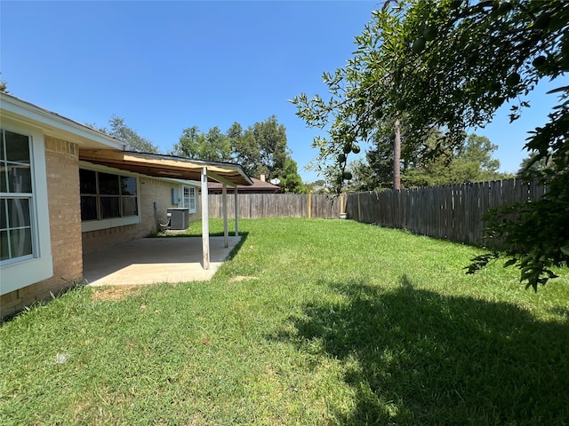 view of yard featuring a patio area and cooling unit