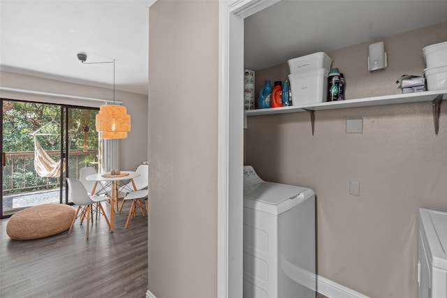 laundry area featuring hardwood / wood-style flooring