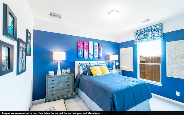 bedroom featuring light colored carpet