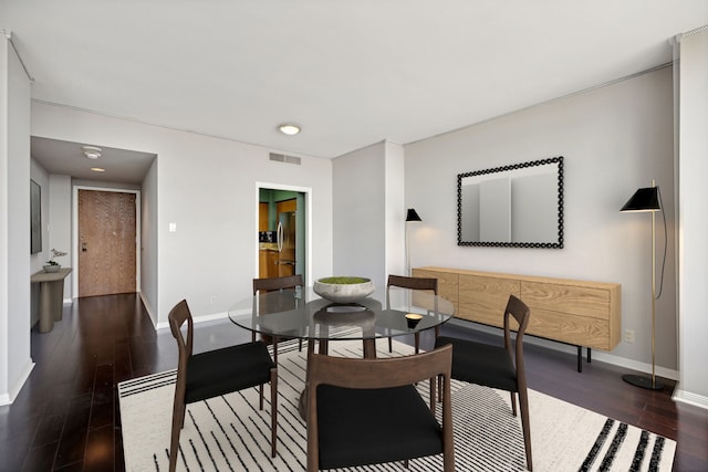 living room featuring dark wood-type flooring