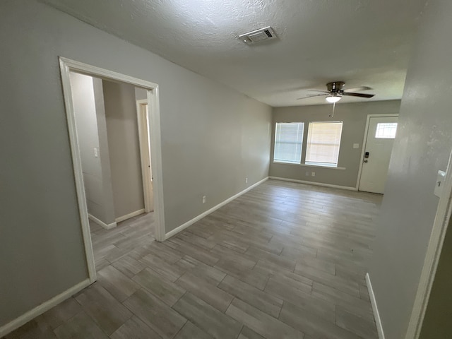 empty room with ceiling fan