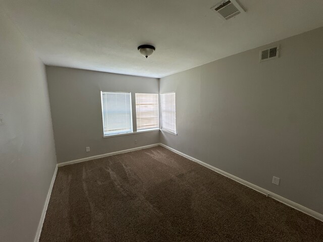 unfurnished room with carpet