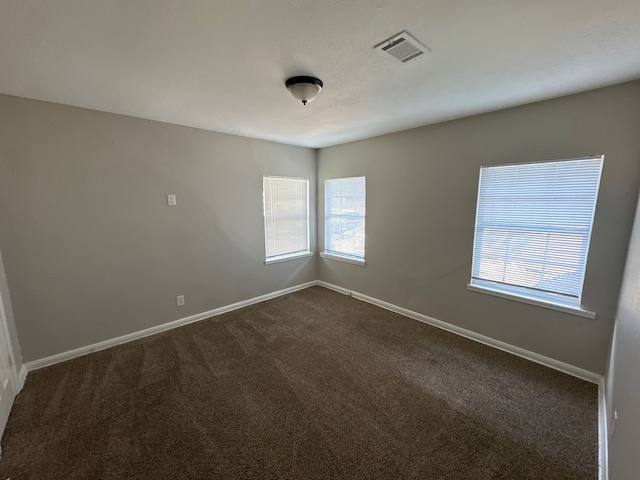 view of carpeted spare room