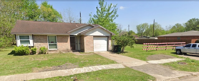 single story home featuring a garage and a front lawn