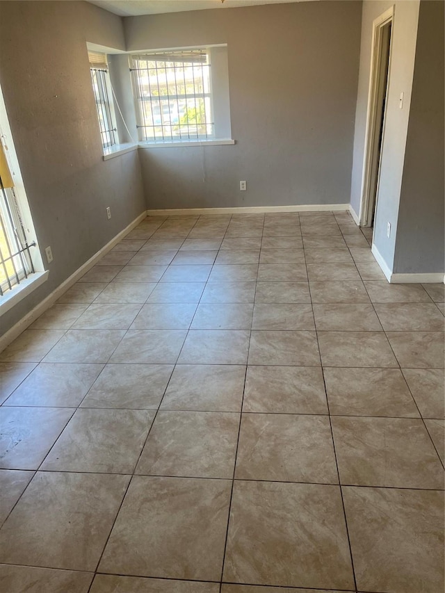 view of tiled spare room