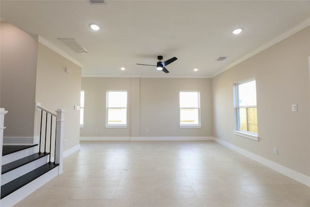 unfurnished living room with ceiling fan, plenty of natural light, and crown molding