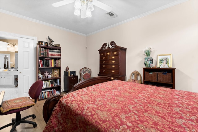 bedroom with ornamental molding, light wood-style flooring, visible vents, and a ceiling fan