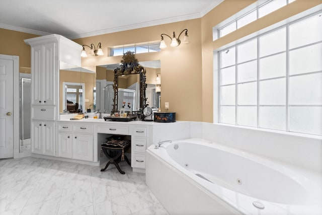 bathroom featuring marble finish floor, crown molding, vanity, and a whirlpool tub