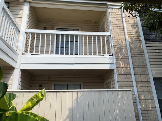 view of property exterior with a balcony