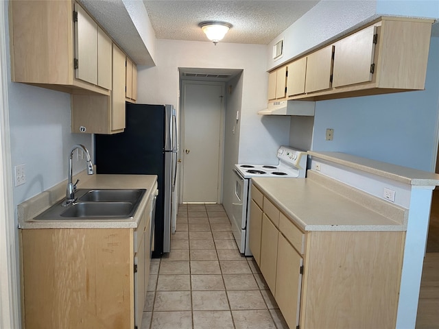 kitchen with sink, electric range, light brown cabinetry, a textured ceiling, and light tile patterned floors