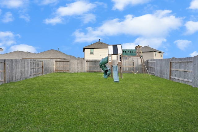 view of yard with a playground