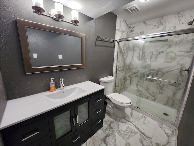 bathroom featuring a shower with door, toilet, vanity, tile patterned floors, and a notable chandelier