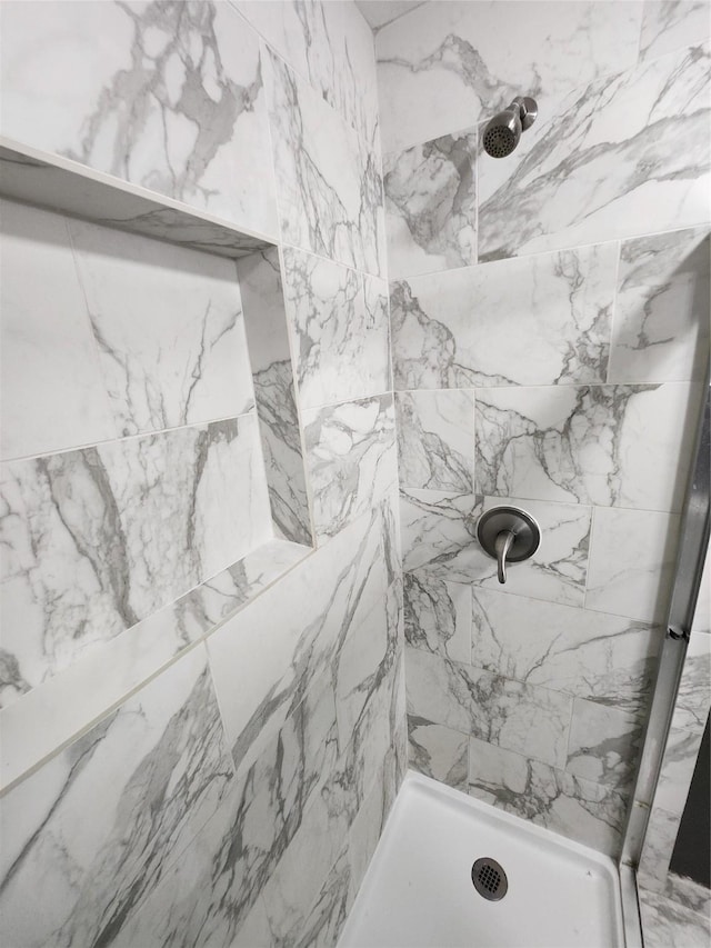 bathroom with a stall shower