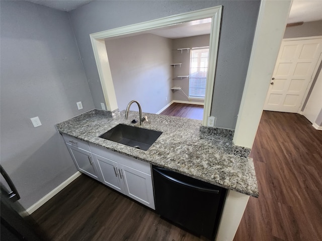 bathroom featuring sink and wood-type flooring