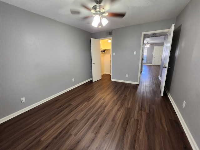 unfurnished bedroom featuring ceiling fan and hardwood / wood-style flooring