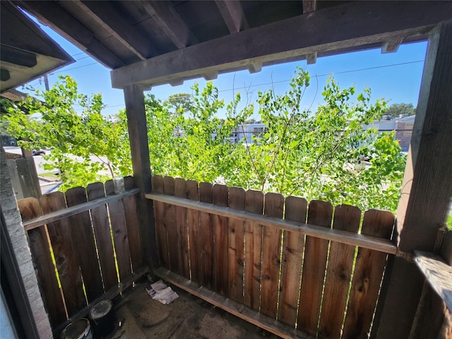 view of patio / terrace featuring fence