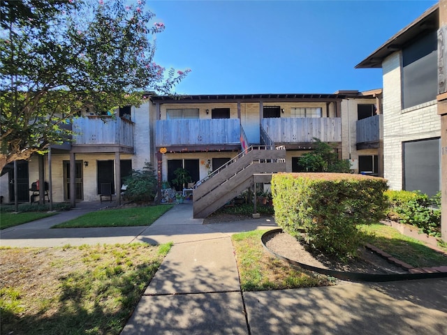 view of property with stairs