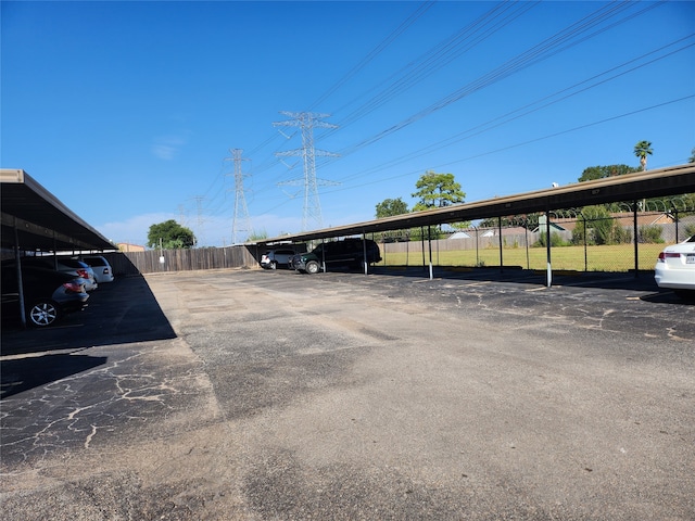 view of vehicle parking featuring a carport