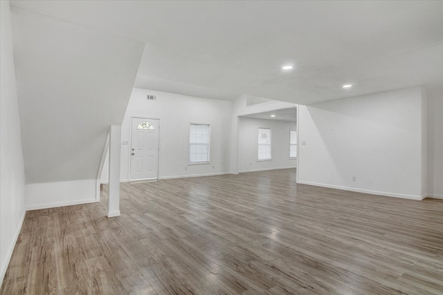 unfurnished living room featuring light hardwood / wood-style flooring