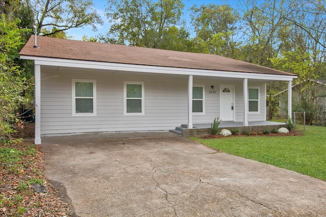 view of front of house with a porch and a front yard