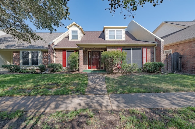 view of front of home featuring a front lawn