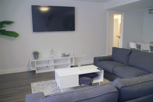 living room with dark hardwood / wood-style floors