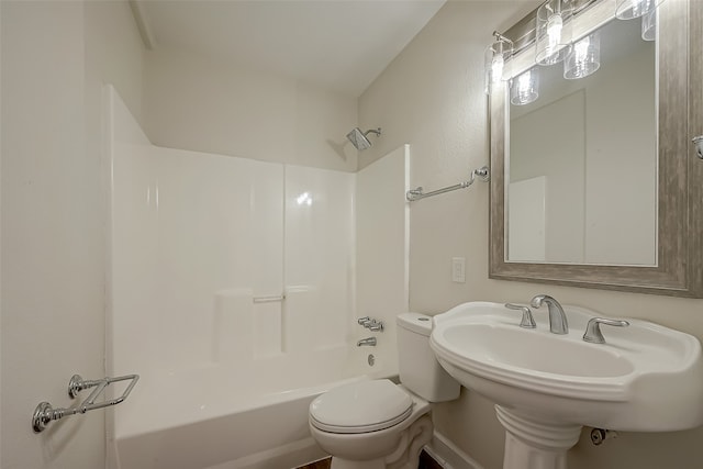 bathroom with bathing tub / shower combination and toilet