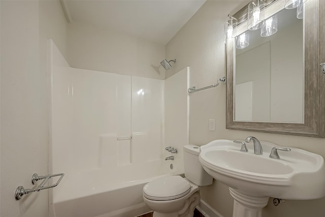 full bathroom with a sink, toilet, and bathtub / shower combination